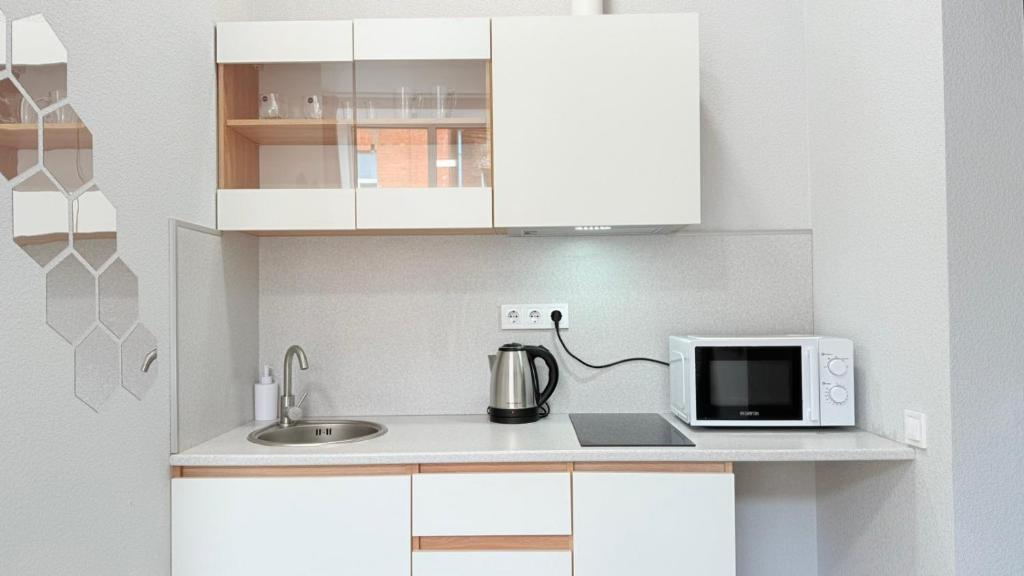 Kuchyň nebo kuchyňský kout v ubytování Centerline Apartments