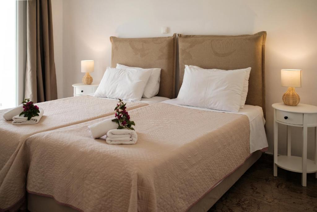 Postel nebo postele na pokoji v ubytování Kalamionas Studios & Apartments