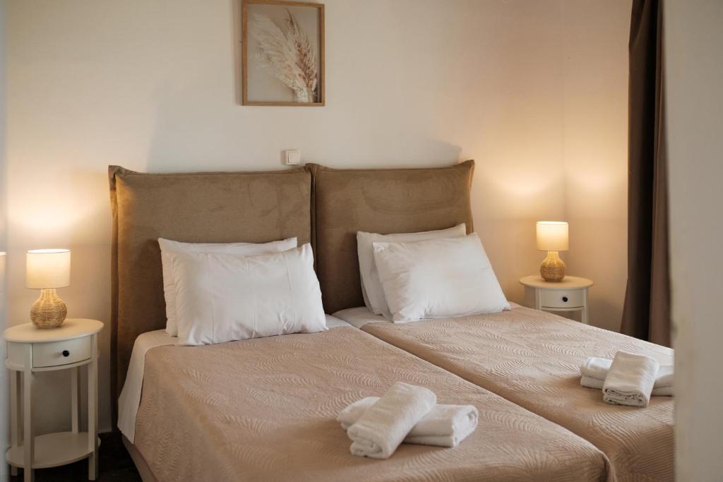 Postel nebo postele na pokoji v ubytování Kalamionas Studios & Apartments
