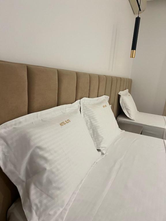Postel nebo postele na pokoji v ubytování Elite hotel and apartaments