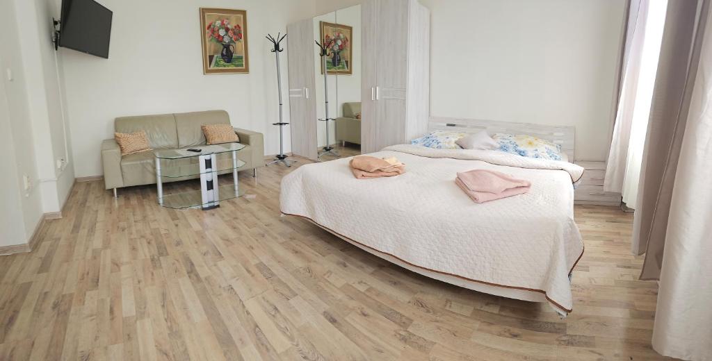 Postel nebo postele na pokoji v ubytování Bluestars Home