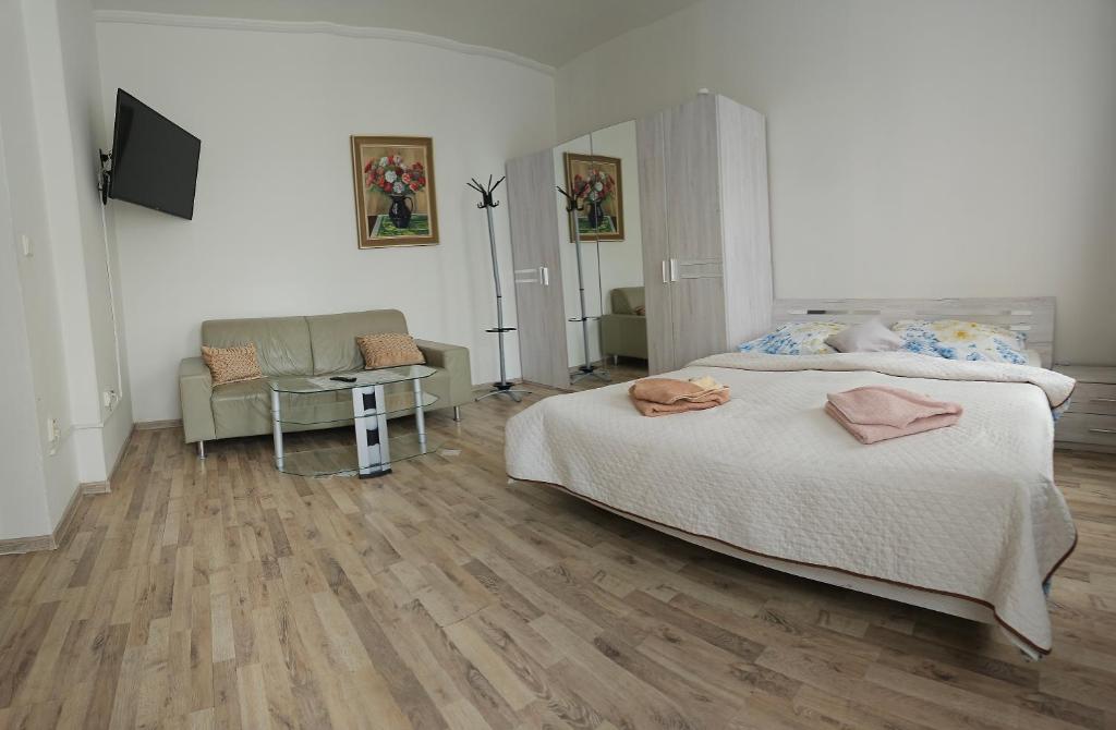 Postel nebo postele na pokoji v ubytování Bluestars Home