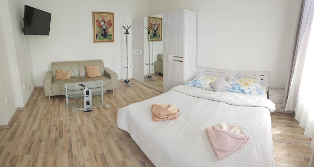 Postel nebo postele na pokoji v ubytování Bluestars Home
