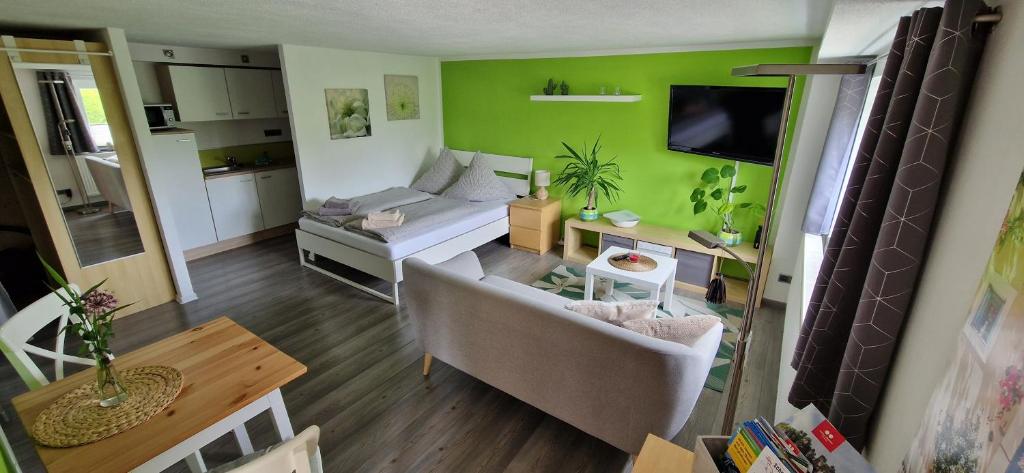 Et tv og/eller underholdning på Ferienwohnung Bergblick