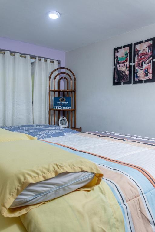 Postel nebo postele na pokoji v ubytování TRANSFER VIP HOSTEL