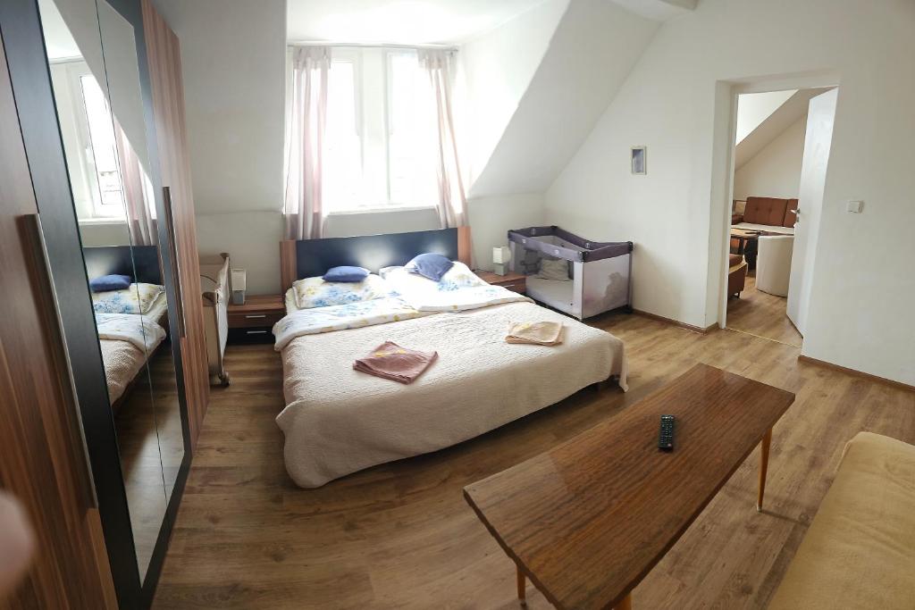 Postel nebo postele na pokoji v ubytování Bluestars Home