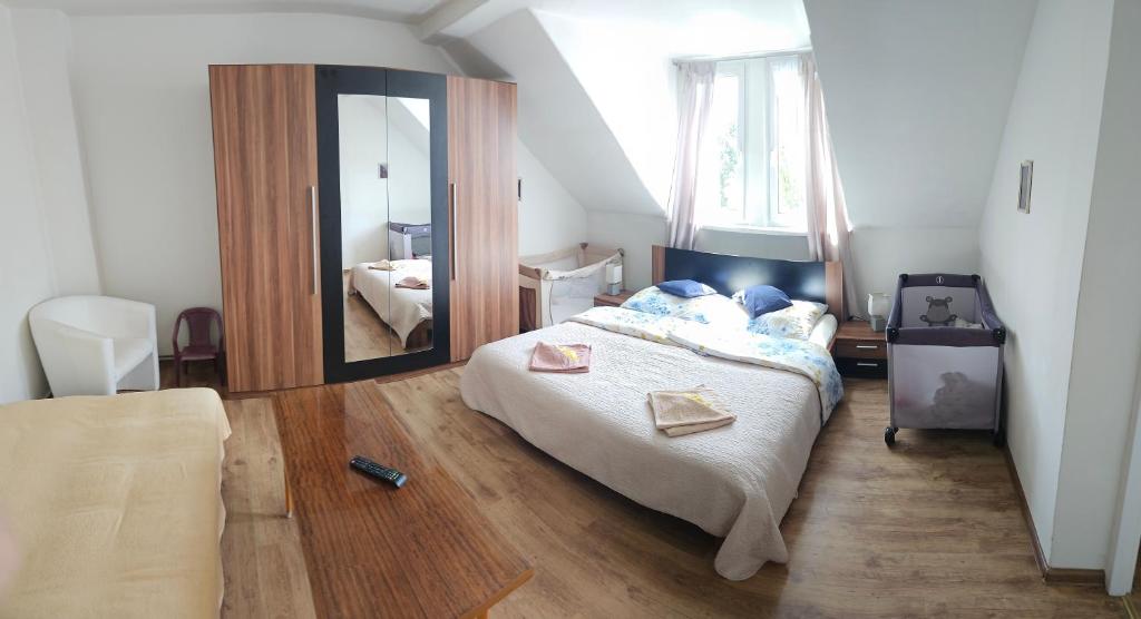 Postel nebo postele na pokoji v ubytování Bluestars Home