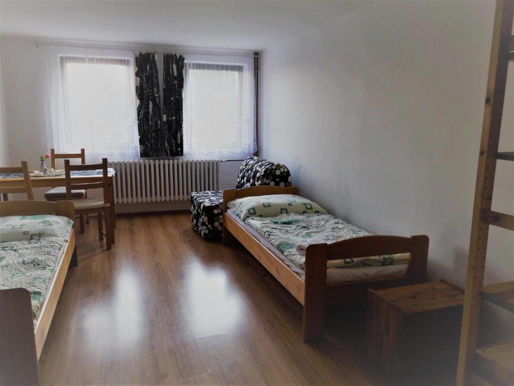 Postel nebo postele na pokoji v ubytování Chata Peklo