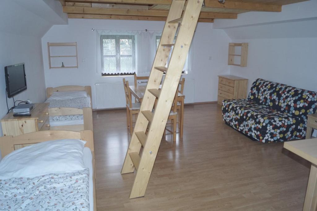 Postel nebo postele na pokoji v ubytování Chata Peklo
