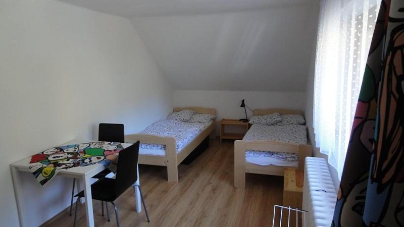 Postel nebo postele na pokoji v ubytování Chata Peklo