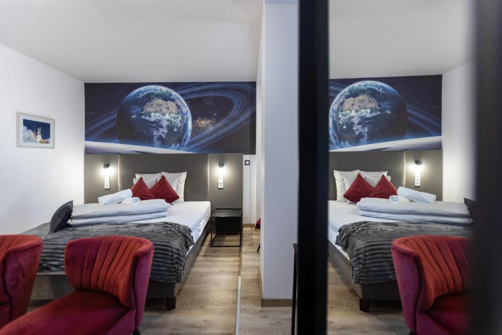Postel nebo postele na pokoji v ubytování R73 Residences