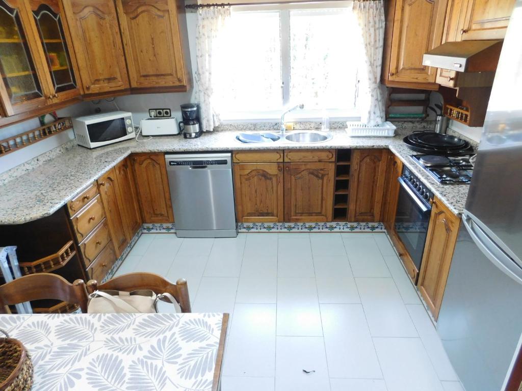Kuchyňa alebo kuchynka v ubytovaní GMID IMMO Casa Canyelles