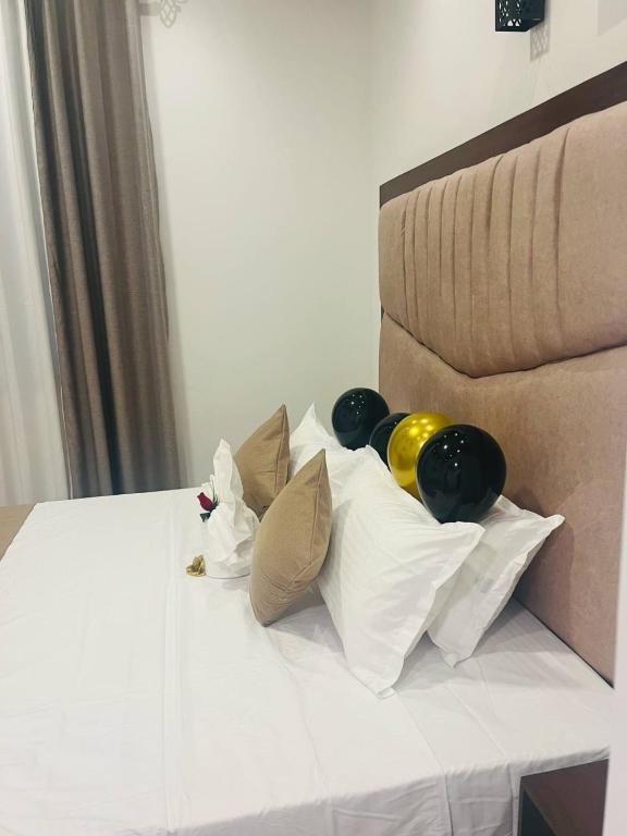 Postel nebo postele na pokoji v ubytování Knuckles View Hotel