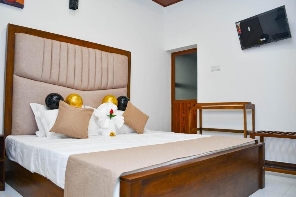 Postel nebo postele na pokoji v ubytování Knuckles View Hotel