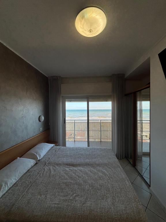 Postel nebo postele na pokoji v ubytování Abahotel