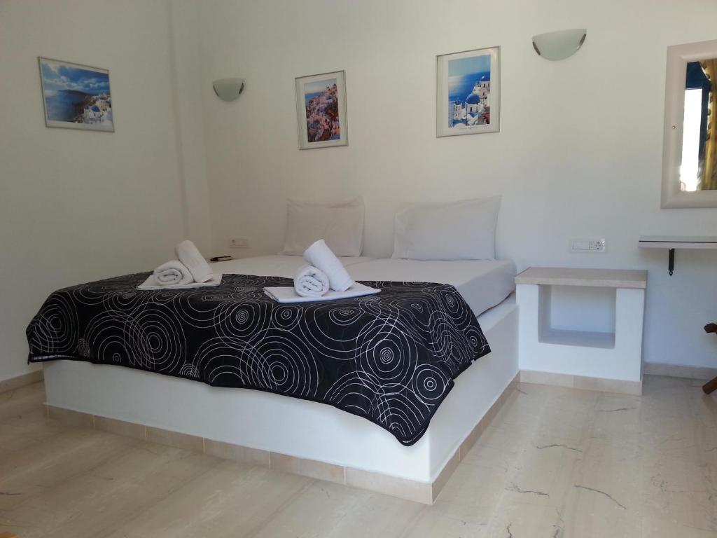 Postel nebo postele na pokoji v ubytování Katefiani Villas