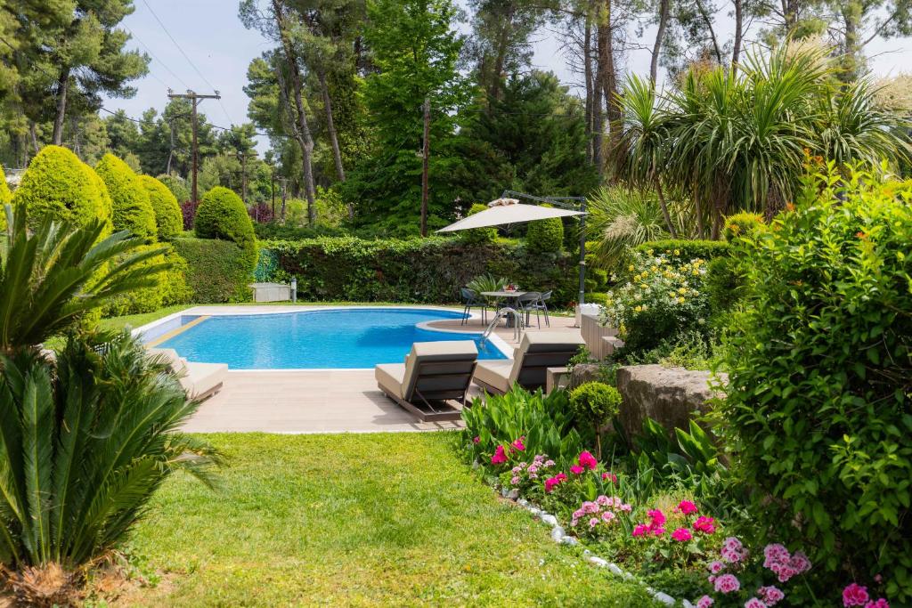 The swimming pool at or close to Sani Green Villa