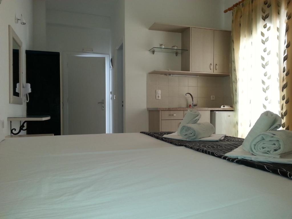 Postel nebo postele na pokoji v ubytování Katefiani Villas