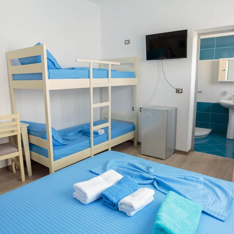 Postel nebo postele na pokoji v ubytování Vila Brilant