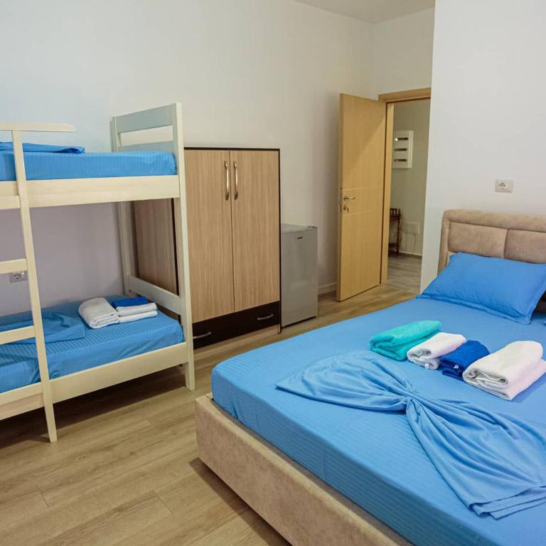 Postel nebo postele na pokoji v ubytování Vila Brilant