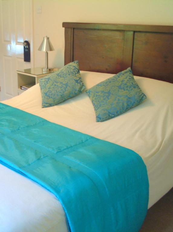 Letto o letti in una camera di Ballacowell