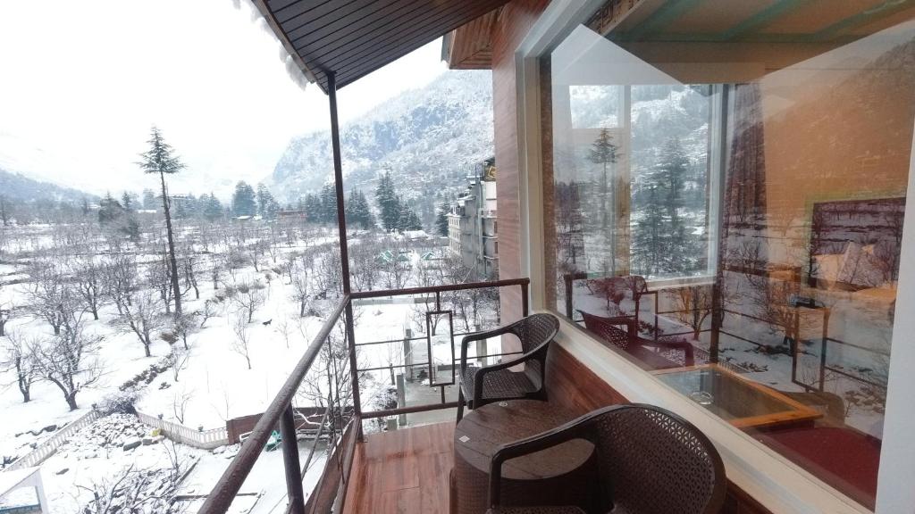 Nespecifikovaný výhled na hory nebo výhled na hory při pohledu z hotelu