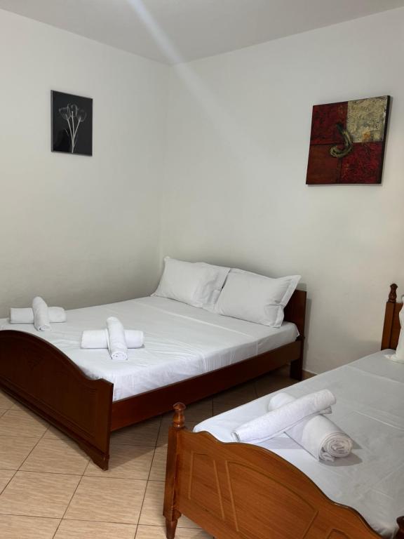Postel nebo postele na pokoji v ubytování Aloha Villa and Suites