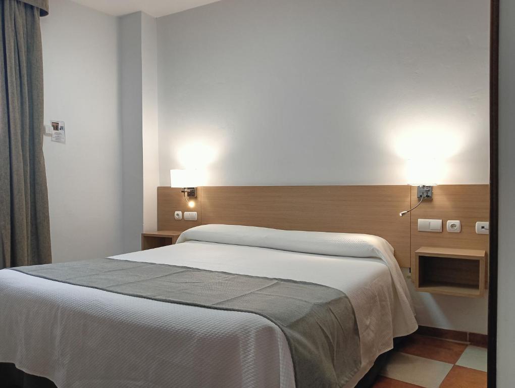 Postel nebo postele na pokoji v ubytování Don Paula