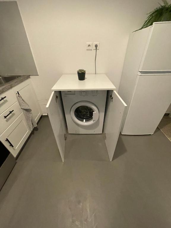 Kuchyň nebo kuchyňský kout v ubytování Spanos Apartments - Panteli
