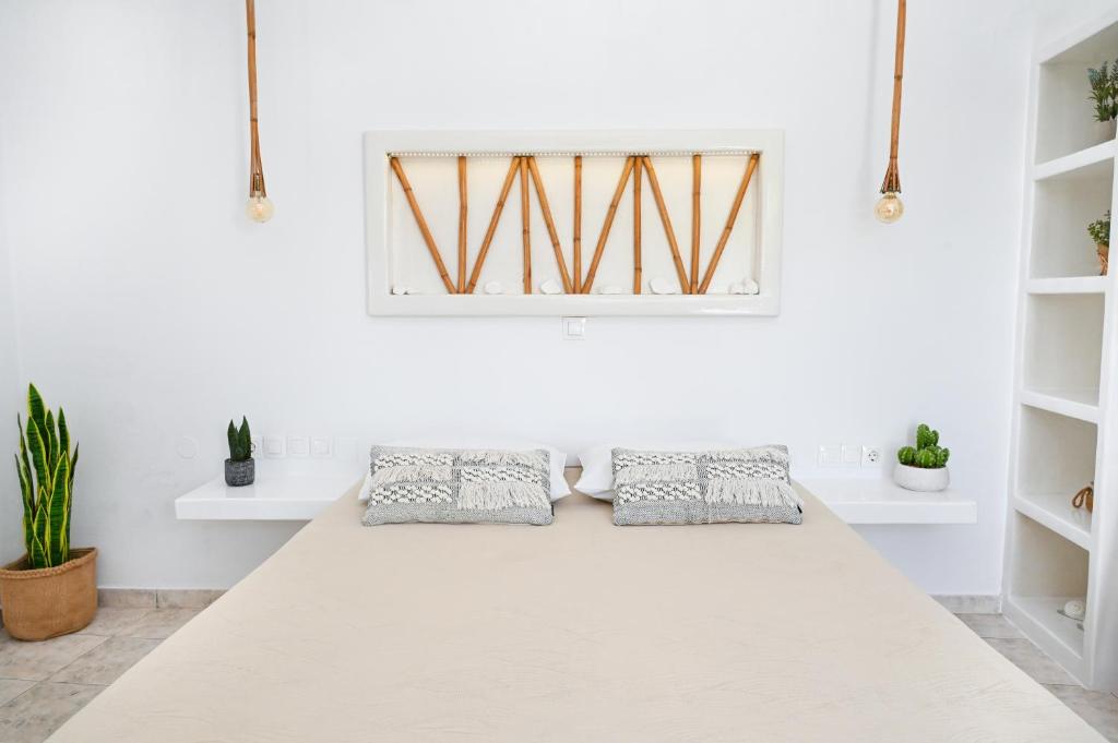 Postel nebo postele na pokoji v ubytování Niki Rooms