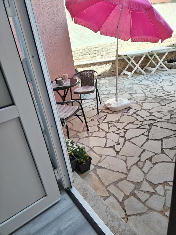 Patio nebo venkovní prostory v ubytování Apartments Mirijana