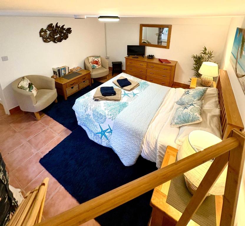 Postel nebo postele na pokoji v ubytování Sandy Cove