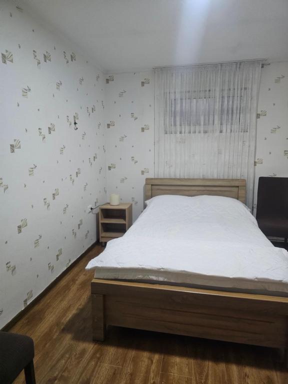 Postel nebo postele na pokoji v ubytování Guest House Mao