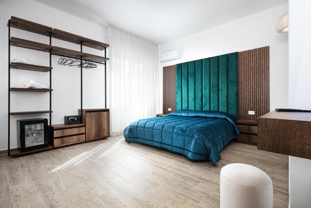 Postel nebo postele na pokoji v ubytování Hotel Levante Cesenatico