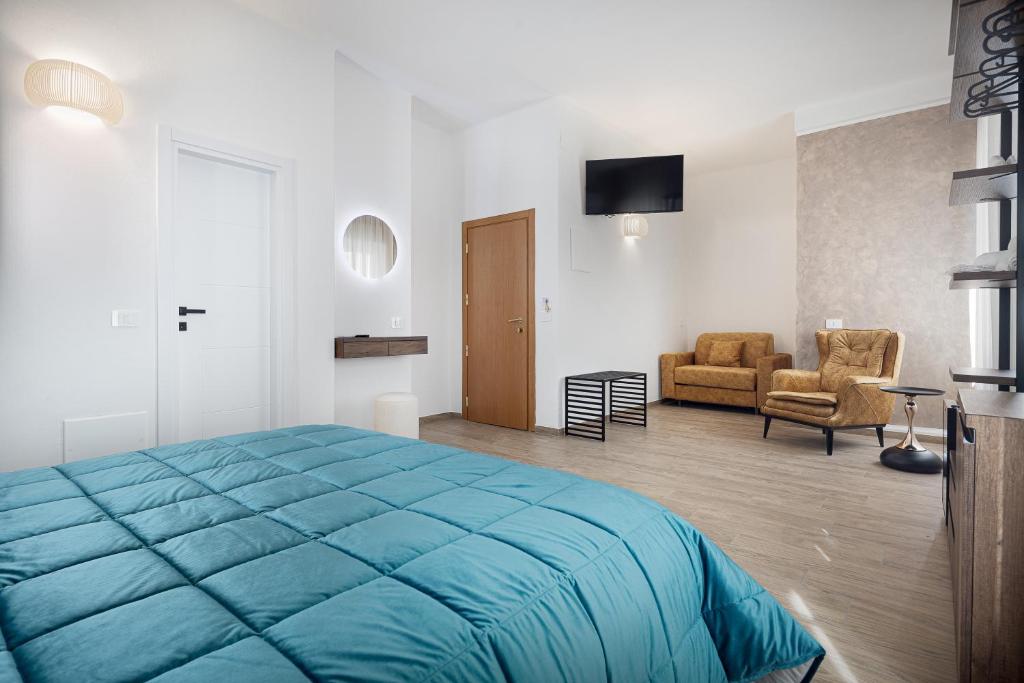Postel nebo postele na pokoji v ubytování Hotel Levante Cesenatico