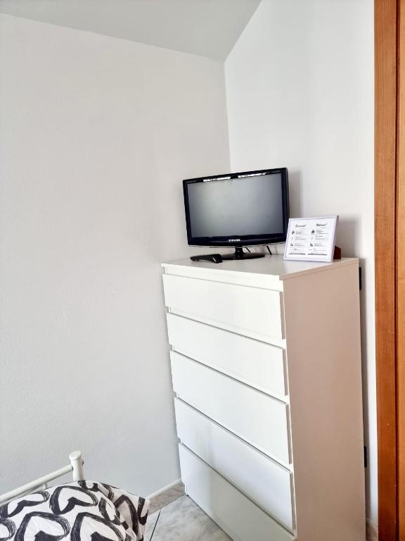 TV a/nebo společenská místnost v ubytování Sea Home - Pinarella