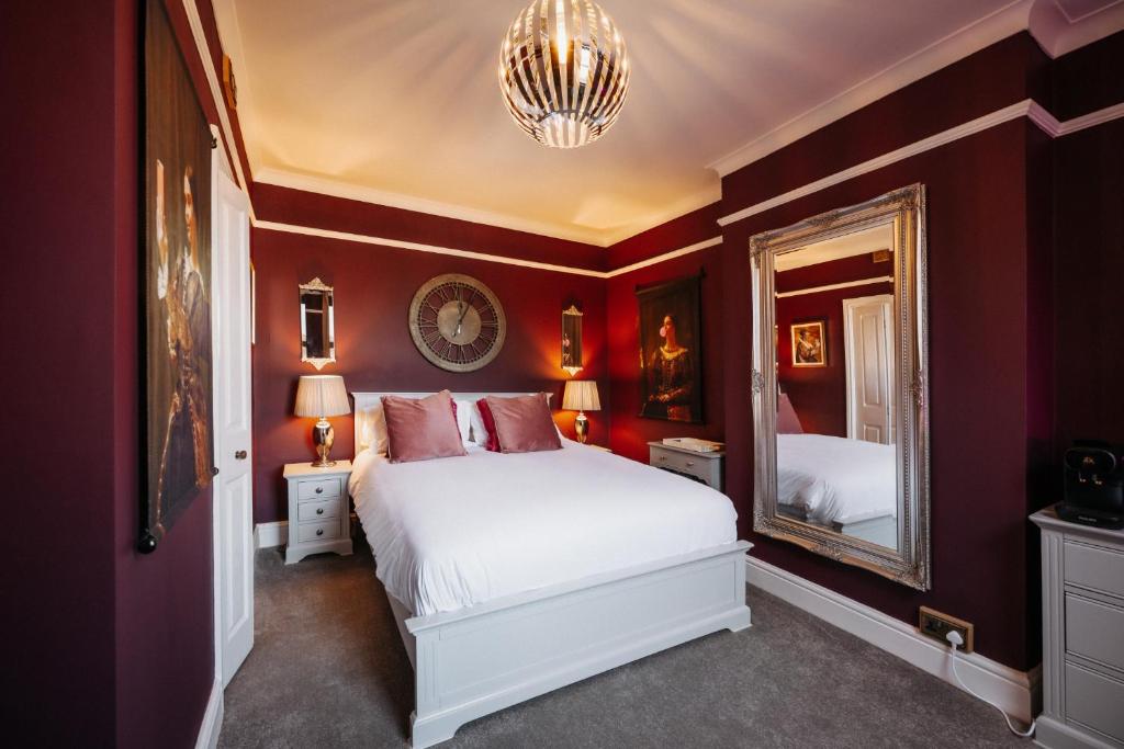 Ένα ή περισσότερα κρεβάτια σε δωμάτιο στο Unique Shrewsbury Rooms