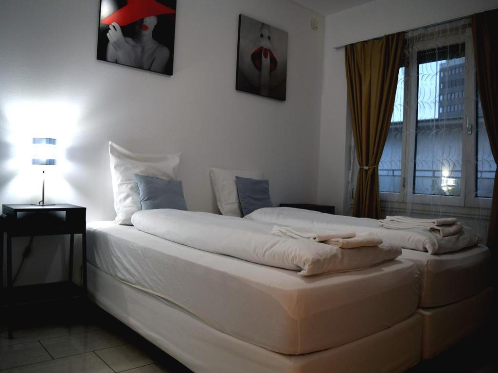 Postel nebo postele na pokoji v ubytování Hotel Restaurant Krebs