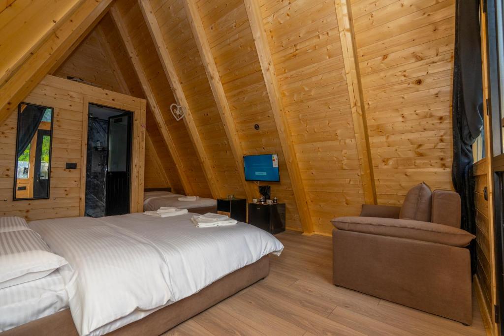 Postel nebo postele na pokoji v ubytování Koceku Lodges