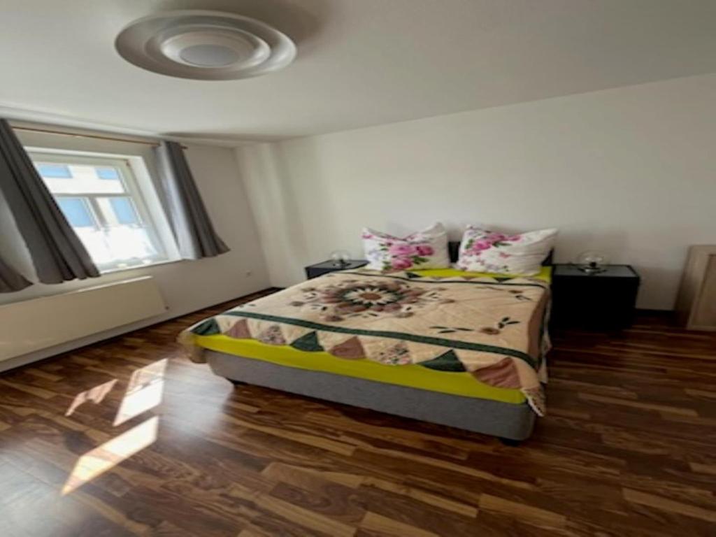 Postel nebo postele na pokoji v ubytování Apartment in Elbingerode near Waterfall