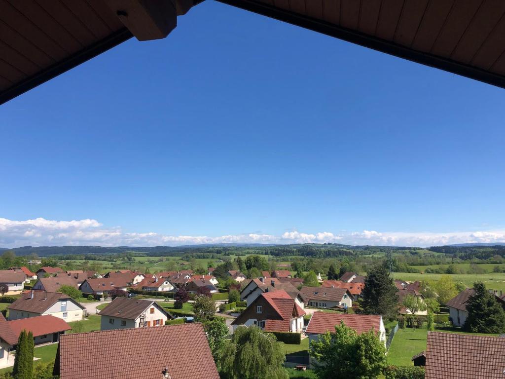 a view of a town from a house at Le Chasseral in Maîche