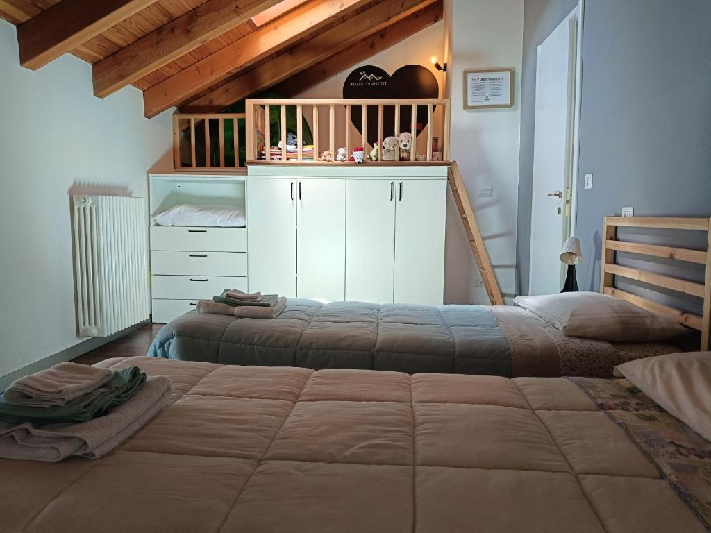 Posteľ alebo postele v izbe v ubytovaní Liberty House Alps