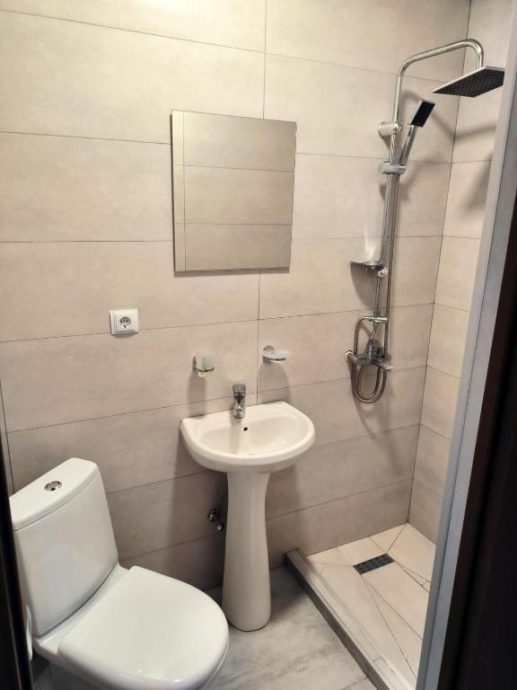 Ένα μπάνιο στο Kamara Guest House
