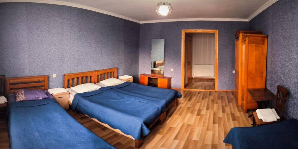 Ένα ή περισσότερα κρεβάτια σε δωμάτιο στο Kamara Guest House