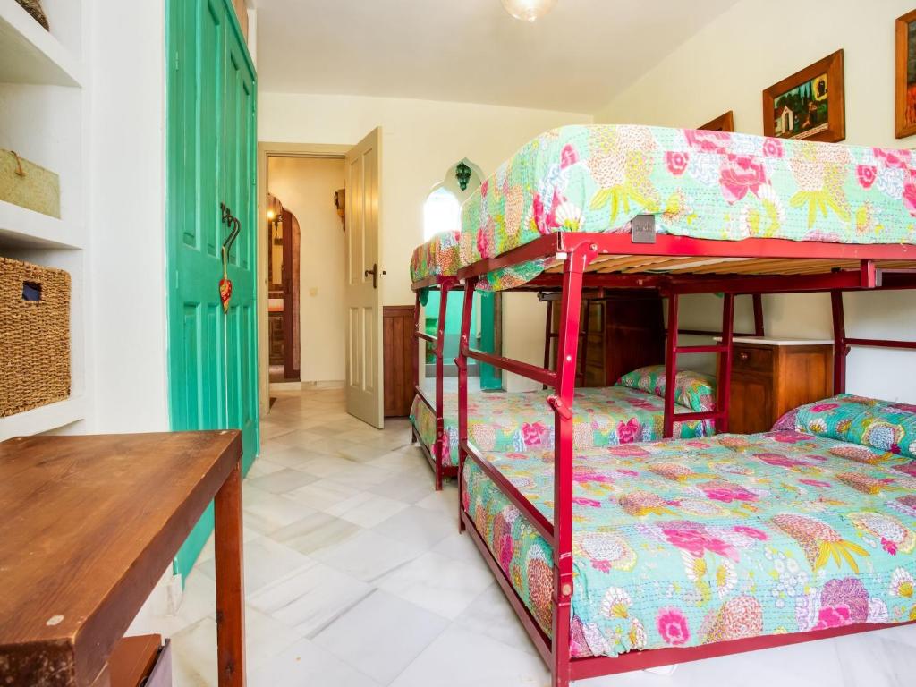 Postel nebo postele na pokoji v ubytování Belvilla by OYO Apartment in SAN ROQUE CADIZ