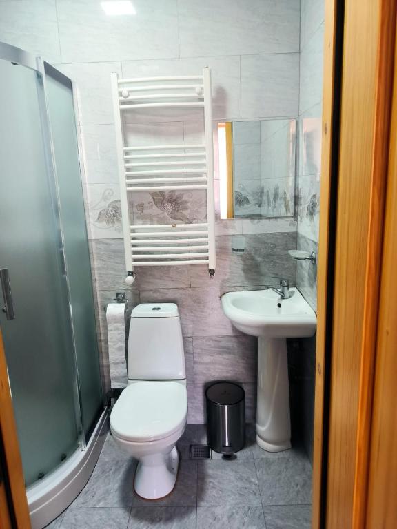 Ванная комната в Kamara Apartment