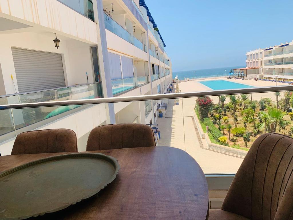 Balkón nebo terasa v ubytování Appart en bord de mer avec piscine vue imprenable