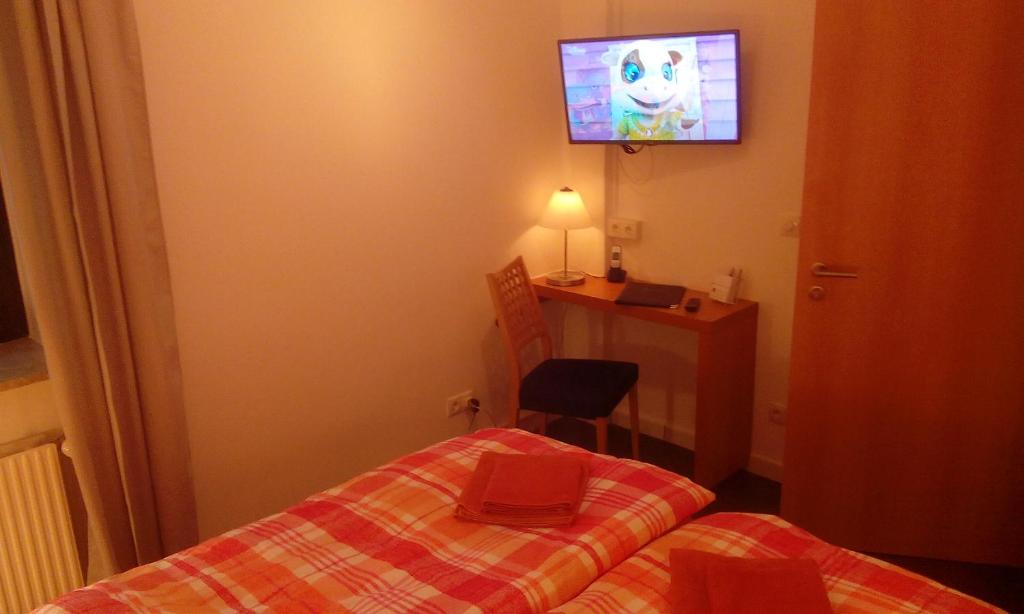 Postel nebo postele na pokoji v ubytování DARZ GästeZimmer