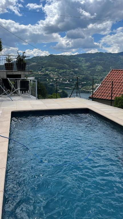 Bazén v ubytování Casa da Lage - Piscina privada - Gerês nebo v jeho okolí
