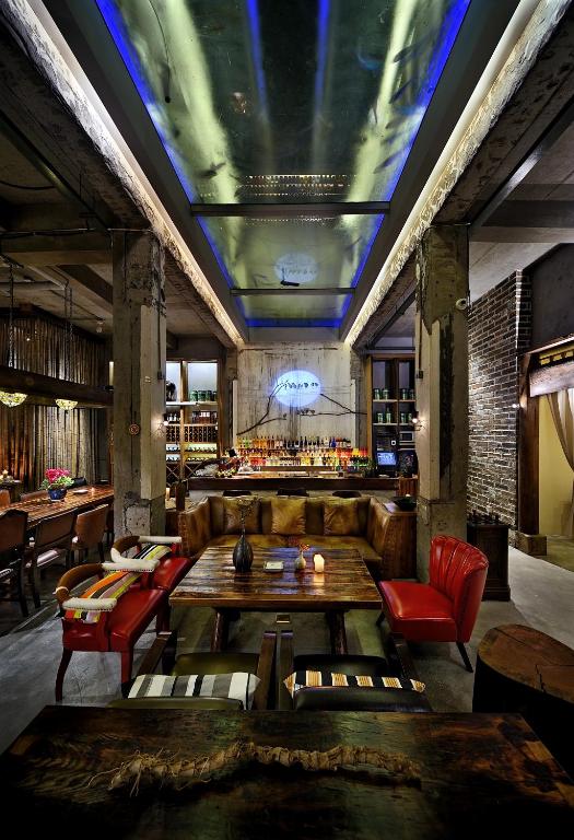 Posezení v ubytování Huangshan Shanshuijian Wei Boutique Hotel